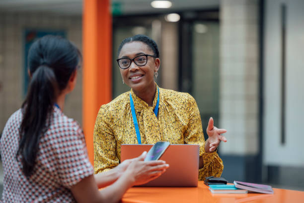 A member discussing their plans with a financial adviser